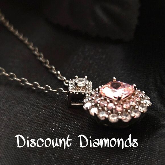 Pink & White Diamond Pendant Necklace wrapped by Baguette Diamonds on 925